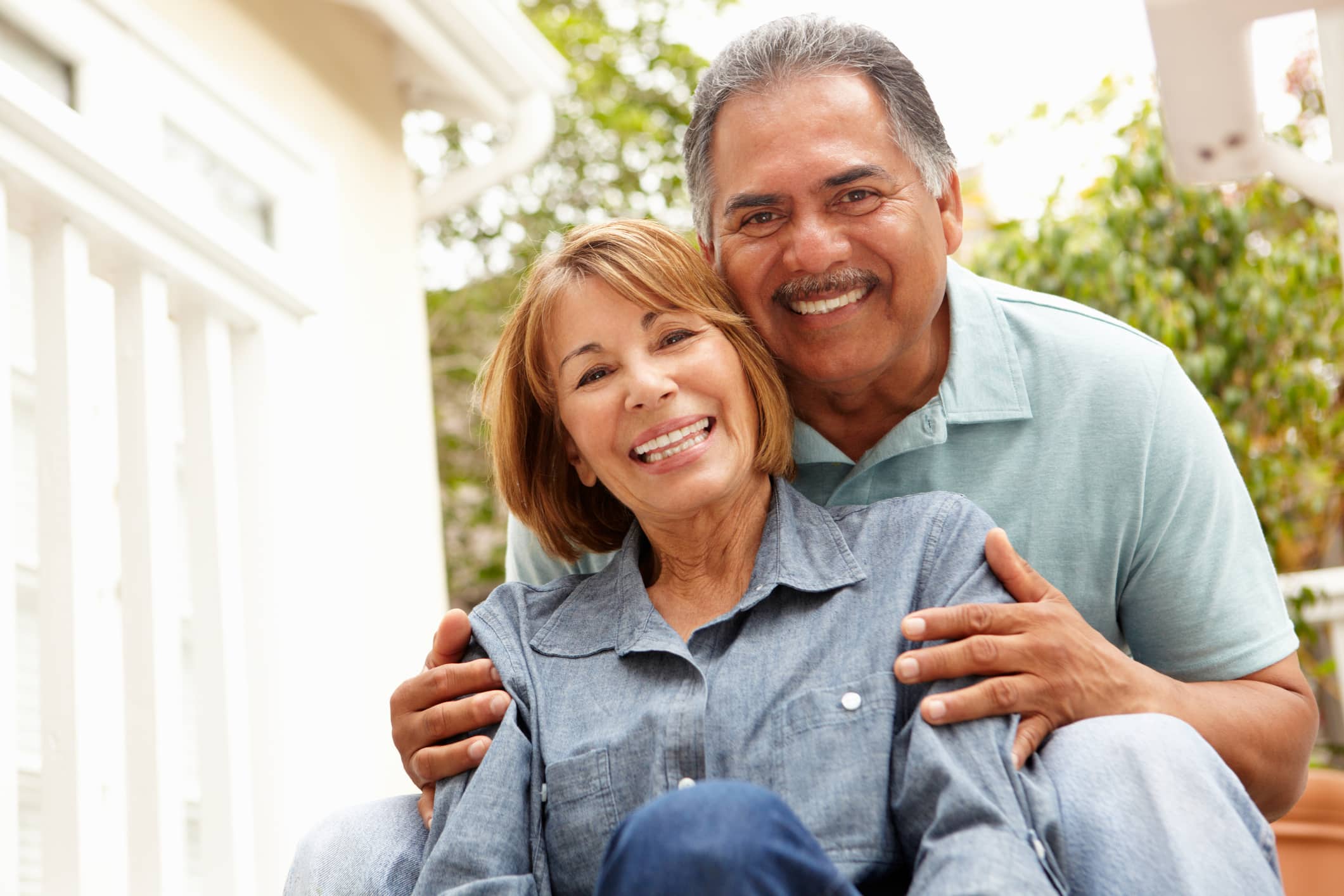 couple-smiling-hugging Couple smiling and hugging